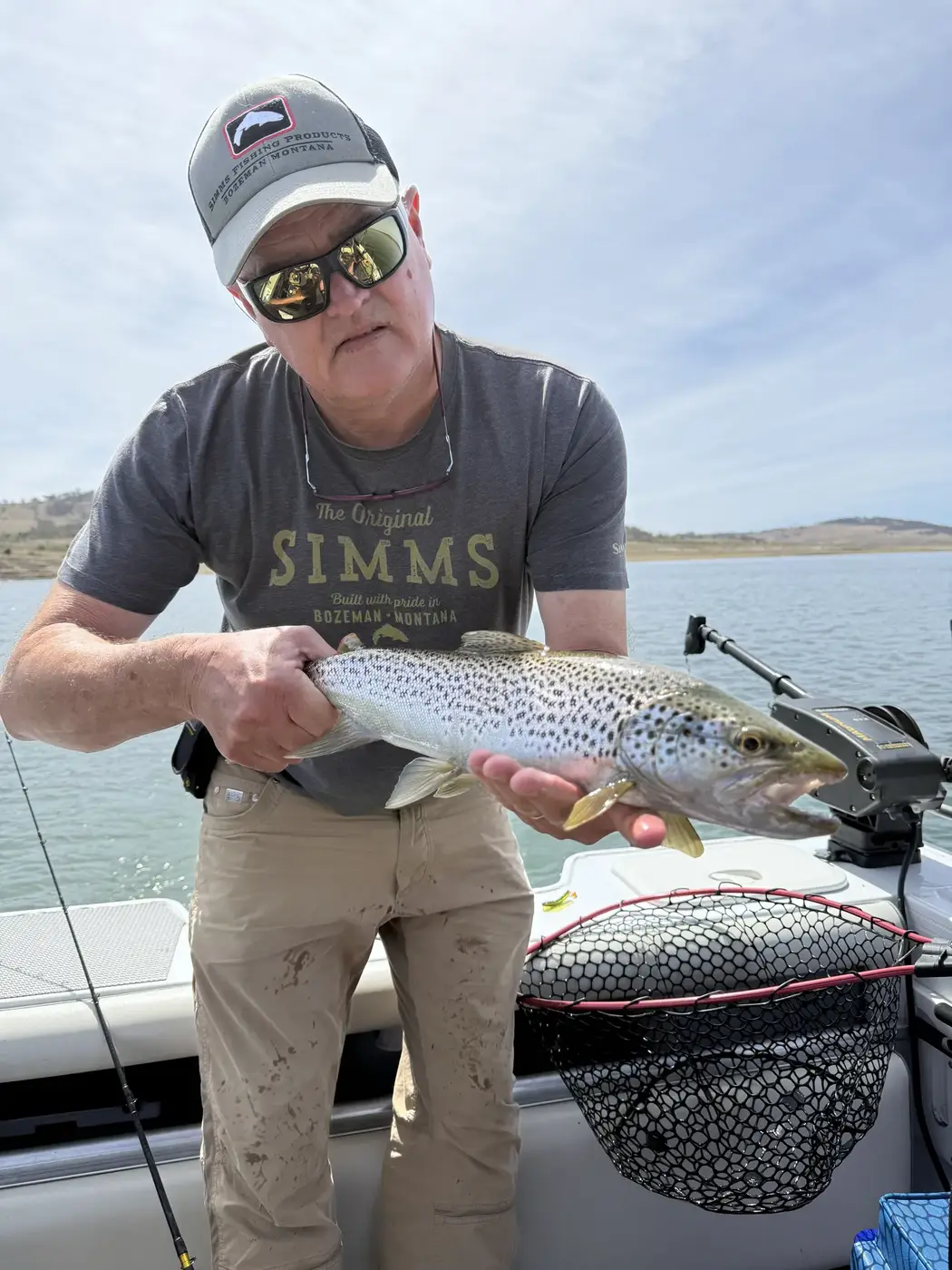 Mick Couvée with a brown trout