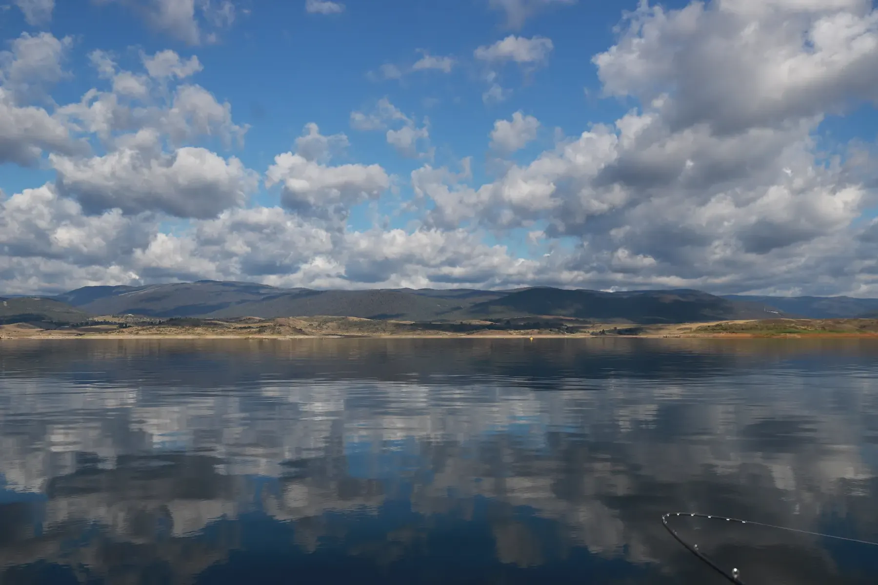 Calm dawn on a Snowy Mountains lake